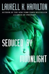 Book cover: Seduced By Moonlight (Book 3 of Merry Gentry) by Laurell K. Hamilton (preview)